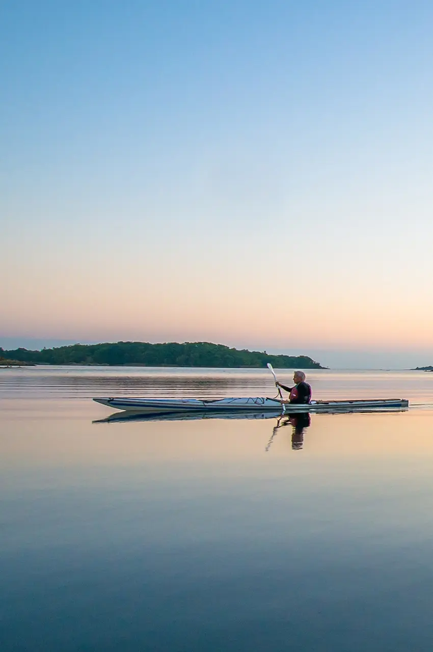 kayaking2 slowly kayaking on a still lake. photo: Robert Ekholm